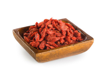 Goji berries in wooden bowl