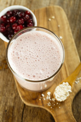 Yogurt smoothie with fresh red berries
