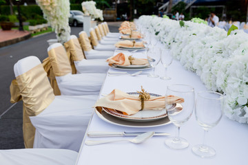 gorgeous wedding chair and table setting for fine dining at outd