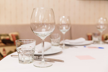 Restaurant table with empty glasses