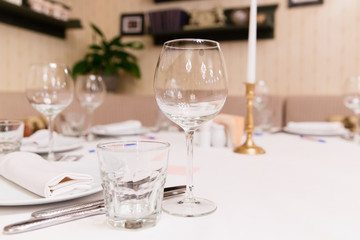 Restaurant table with empty glasses