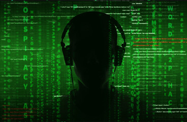 hacker at work with graphic user interface around