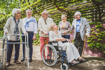 Senior people walking outdoors