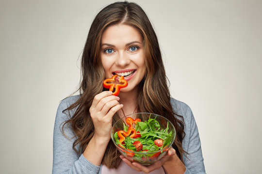 face close up portrait of happy woman eating salad.