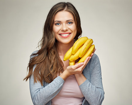 smiling woman portrait with vitamin diet food banana.
