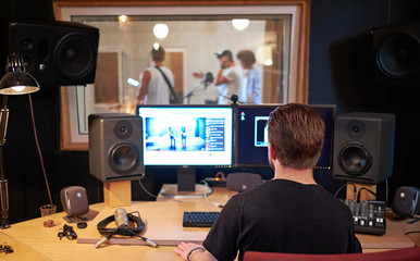 Music band during cd recording in studio