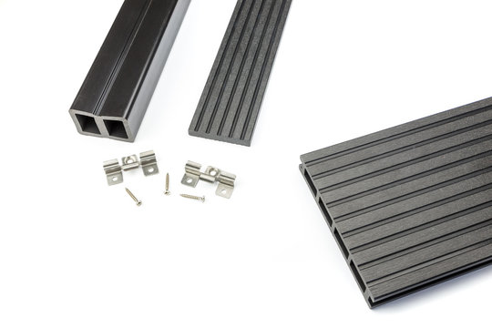 Black composite decking board with mounting material