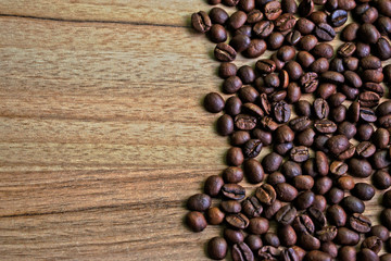 Coffee beans on a wooden table
