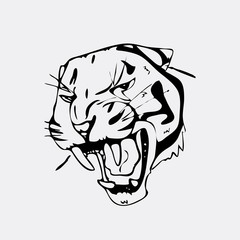 Hand-drawn pencil graphics, tiger head. Engraving, stencil style. 