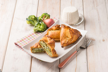 oven panzerotti with broccoli and ricotta cheese