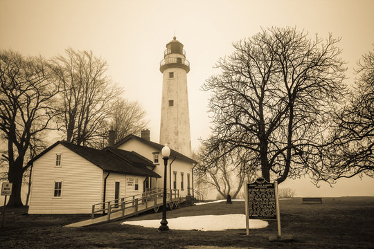 Haunted And Historical Michigan Lighthouse.  The reportedly haunted Pt. Aux Barques Lighthouse on the remote shores of Lake Huron in Port Hope, Michigan.