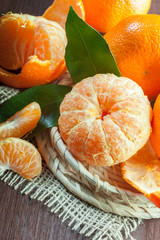 fresh mandarines on wooden table