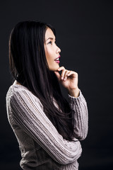 Fototapeta premium Beautiful Young Asian Woman Thinking