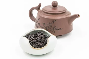 Foto op Aluminium Chinese Oolong Dark Red tea (Black Tie Guan Yin) with small pot © bestforbest