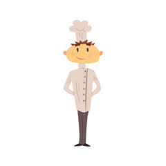 Professional Cook In Classic Double Breasted White Jacket And Toque Posing Smiling