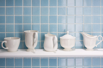 White ceramic bottle and cup