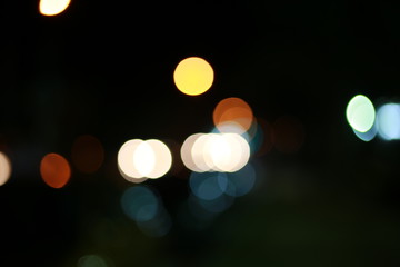 Blurred flower field background, lighting in city night light blur bokeh , defocused background