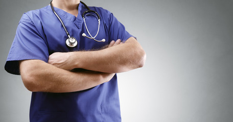 Doctor in scrubs with stethoscope