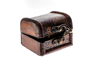 Old wood chest jewelry box closed isolated on white background.