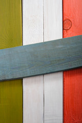 The old boards painted in the colors of the Italian flag with sp