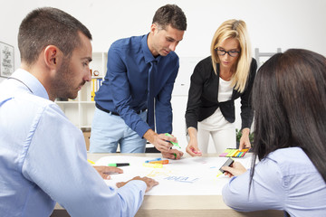 Fototapeta premium Group Of Business People Having Meeting In Office. Team work