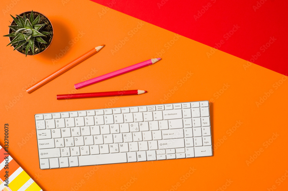 Fototapete computer workspace with keyboard on colorful office table or desk seen from above. top view product 
