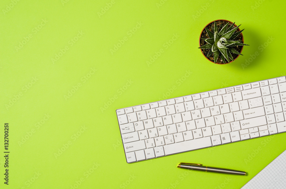 Fototapete computer workspace with keyboard on colorful office table or desk seen from above. top view product 