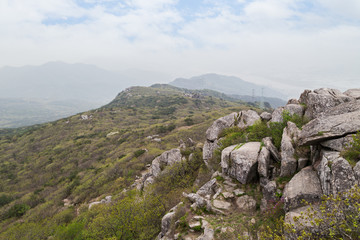 Fototapeta na wymiar View of lush and rocky landscape at the Geumjeongsan Mountain in Busan, South Korea.