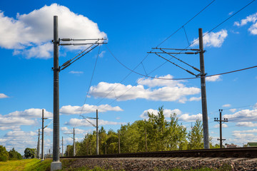 Railroad tracks and catenary power line cables