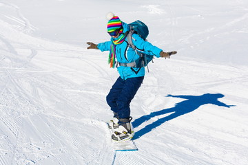 Fototapeta na wymiar Woman, snowboard winter, rides, goggles