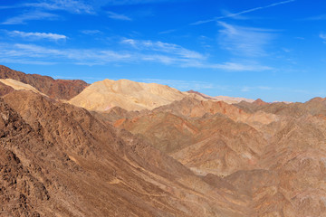 Fototapeta na wymiar Desert mountains with blue sky in the background 