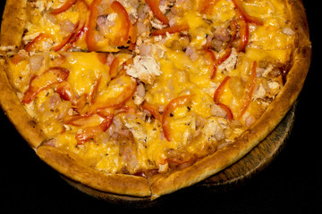 fresh Italian pizza on a black