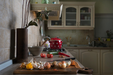 Food leftovers on kitchen counter. Household waste from vegetable ready to compost. Environmentally responsible behavior, ecology concept..
