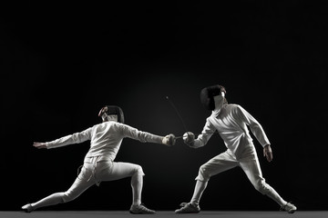 Fencers fencing