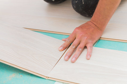 Installing laminate floor with wooden texture