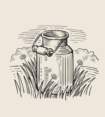 Milk cans with grass