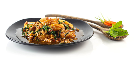 Dish of stir fried eggs tofu with pork  and holy basil