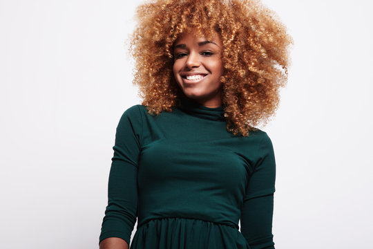 happy smiling african american black woman with blonde hair