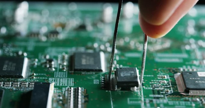 Macro shot of a chip, futuristic and modern advanced technology system. The circuit is used in the computer processor and the hi-tech communication and business security and information and assistance