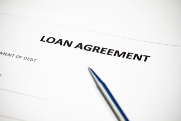 Obraz premium Loan agreement document with pen