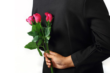 Woman making proposal with rose flowers isolated
