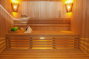 Sauna room with traditional sauna accessories