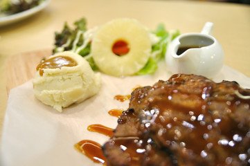 Pork ribs BBQ sweet sauce Western food style with salad and mash