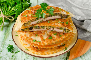 Meat with mushrooms and herbs baked in pastry