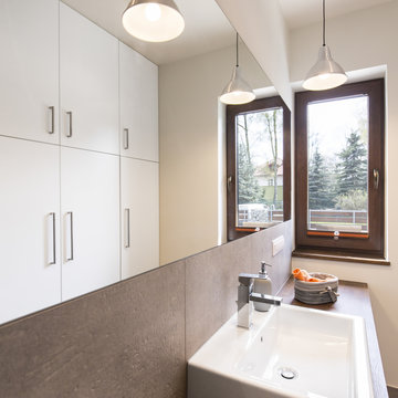 Modern bathroom with wooden unit