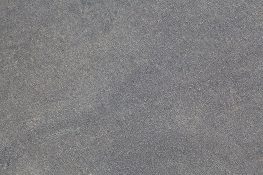 Natural grey stone texture and seamless background