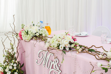 luxury wedding table with beautiful flowers. pink stylized