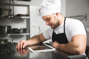 Chef searching for recipes online