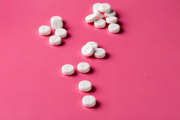 Obraz na płótnie Canvas Heap of round white pills
