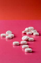 Heap of round white pills